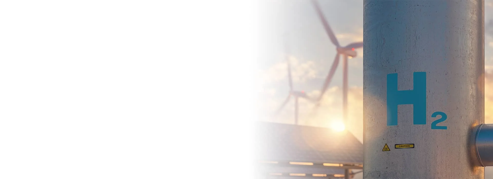 Wasserstoff Anlage mit H2 Kennzeichnung und Windrädern als Symbol für Energiewende und Zukunftstechnologien